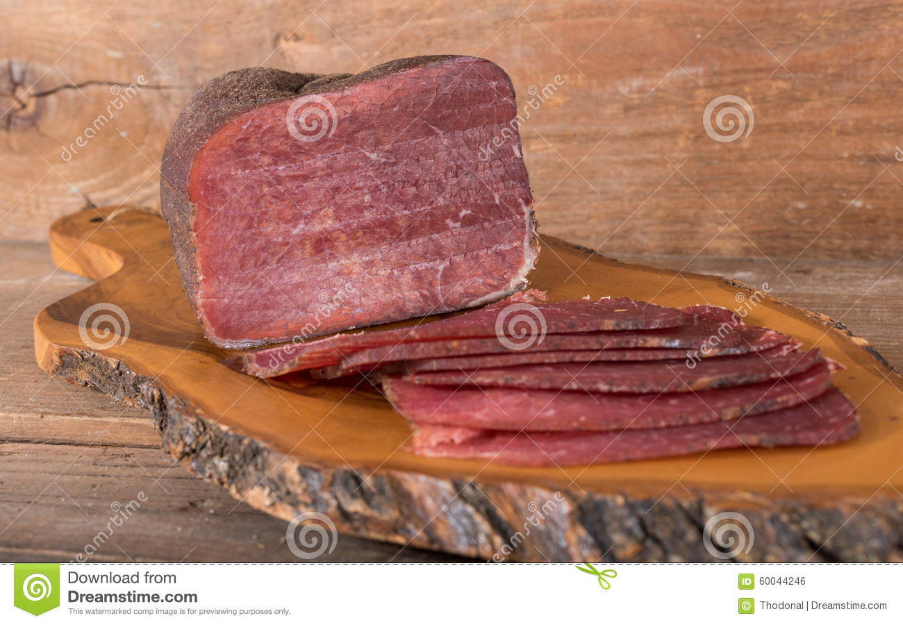 Dried Meat On Wooden Background