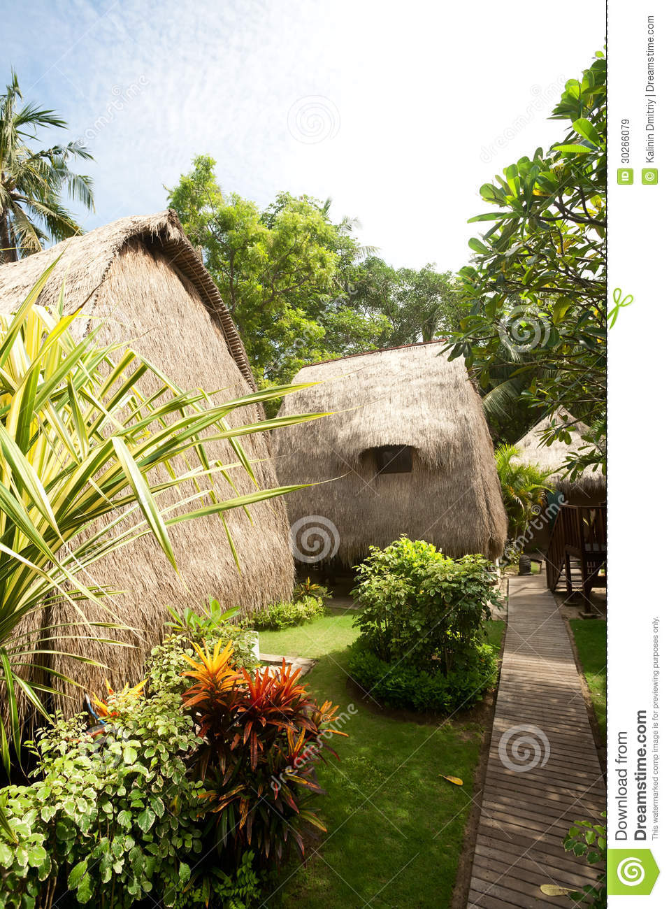 Thatch Roof Bungalow At Tropical Resort Royalty Free Stock Images